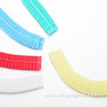 Disposable nonwoven bouffant clip cap